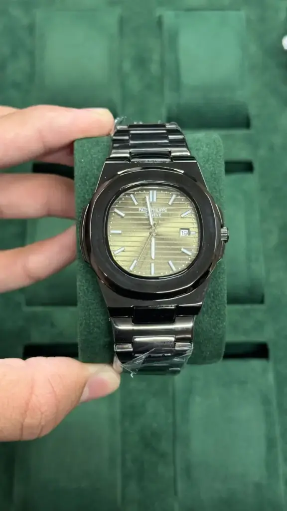 Patek Philippe Nautilus Black Stainless Steel Watch – Gold Dial